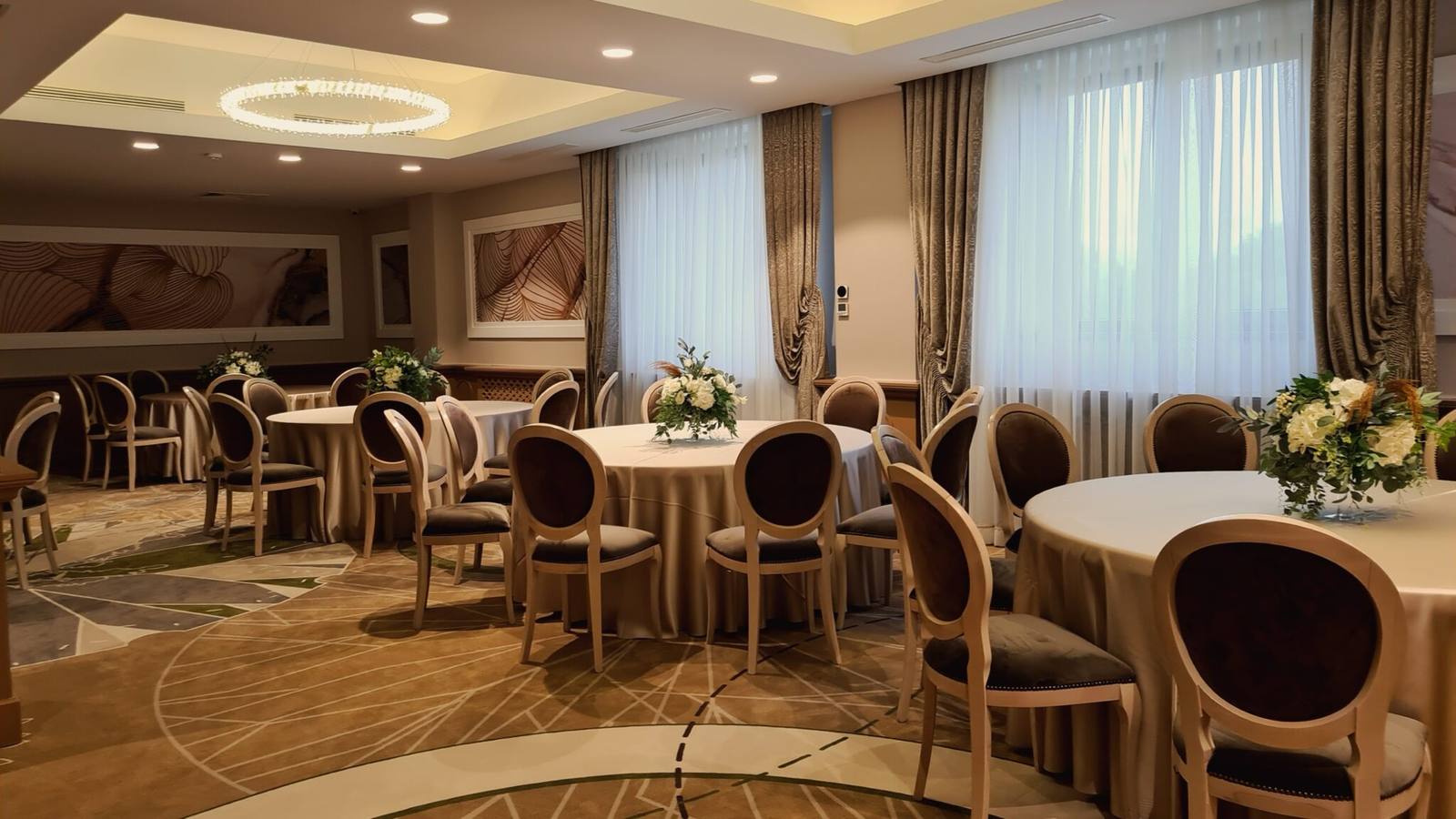 Banquet hall with round tables set