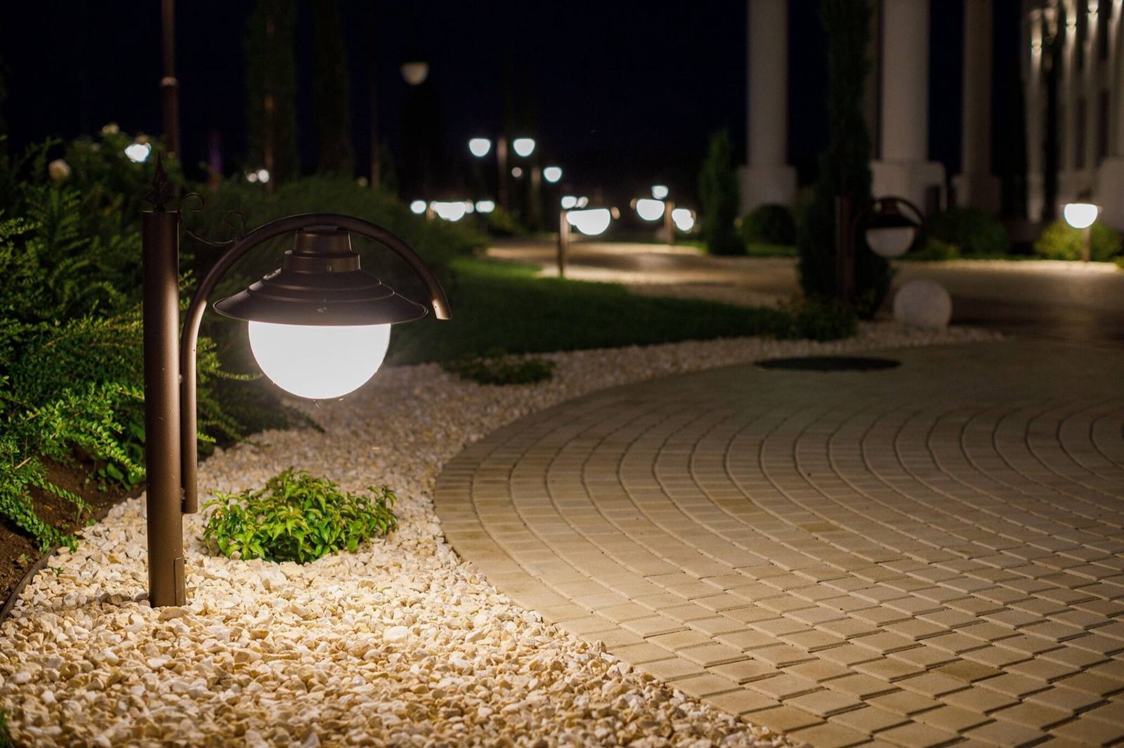 The estate walkways lit up in the evening